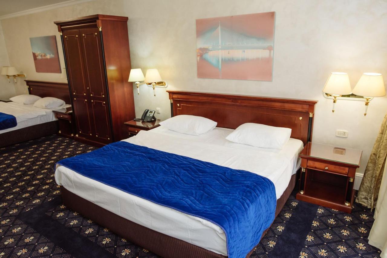 A Hoteli - Hotel Izvor Arandjelovac Exterior photo A bedroom in a hotel